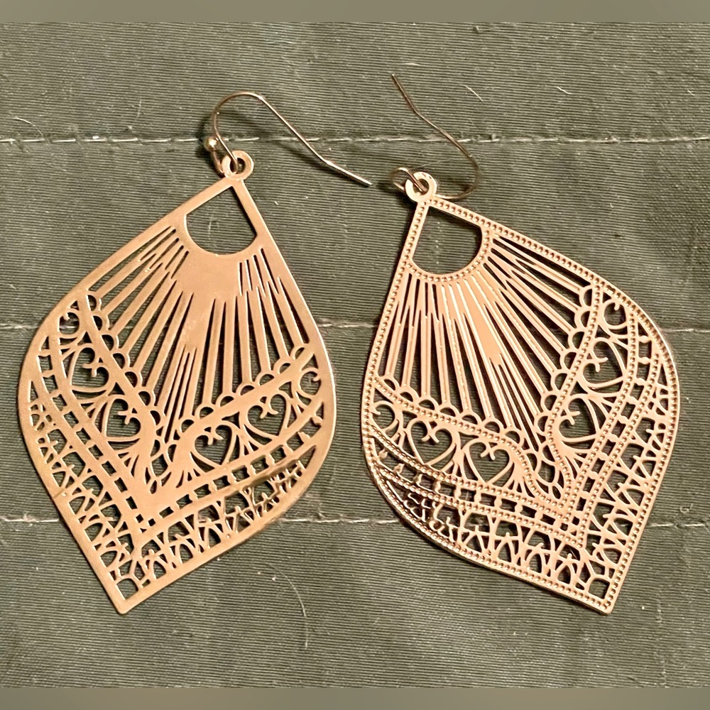 Intricate silver light weight big statement earrings